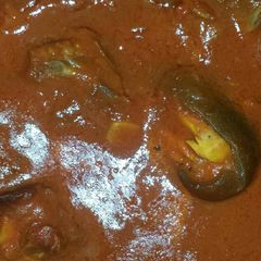 A picture of Tomatoes stew.