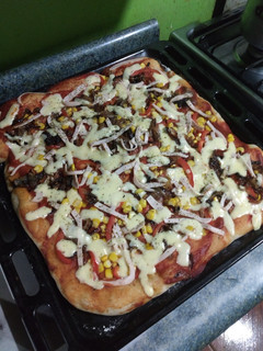 Una foto de Pizza con vegetales