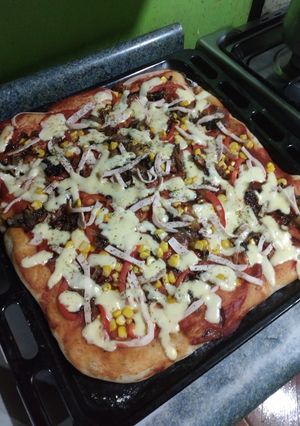 Una foto de Pizza con vegetales