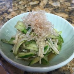 A picture of Enoki mushrooms and cucumber with umeboshi flavored ponzu dressing.