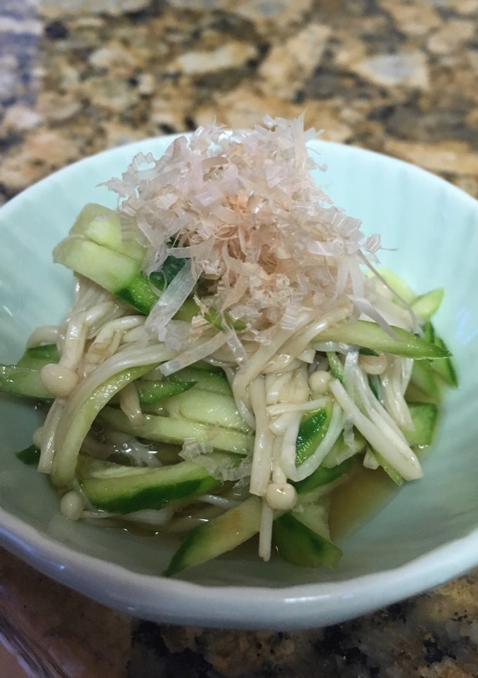 A picture of Enoki mushrooms and cucumber with umeboshi flavored ponzu dressing.
