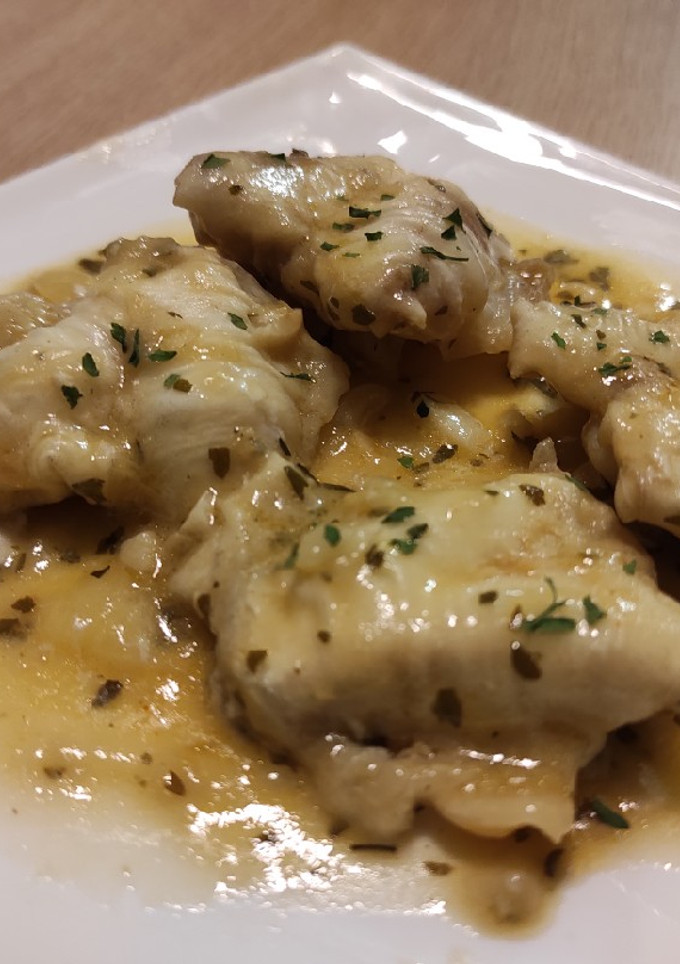 Una foto de Kokotxas de bacalao en salsa verde