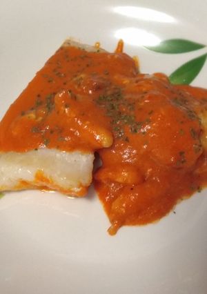Una foto de Bacalao con salsa de pimientos