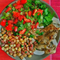 A picture of Githeri and Grilled chicken.