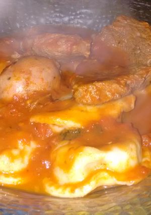 Una foto de Sorrentinos caseros de espinaca, carne y ricota