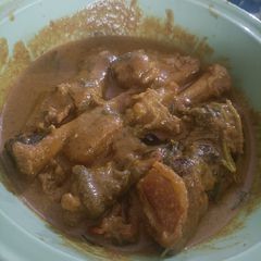 A picture of South indian mutton leg curry.
