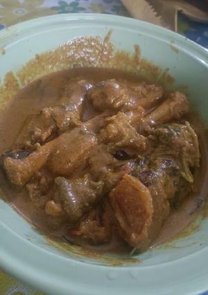 A picture of South indian mutton leg curry.
