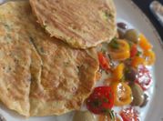 Una foto de zucchini queso