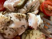 Una foto de filetes de merluza light
