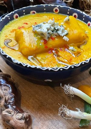 A picture of Red Lentil Velouté with Scallions and Habanero Peppers.
