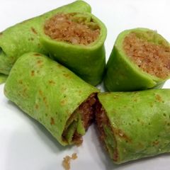 A picture of Coconut Crepe Roll /Kuih Ketayap.