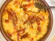 Una foto de bacalao en salsa de pimiento
