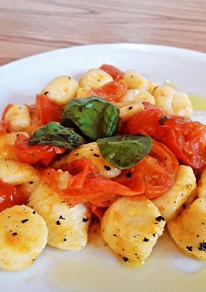 Una foto de Gnocchi di ricotta con salsa suave de tomates