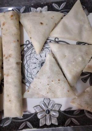 A picture of Homemade rollpatty and samosa With vegetable filling.