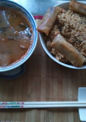 A picture of Japanese beef sauage teriyaki sauce steamed rice.