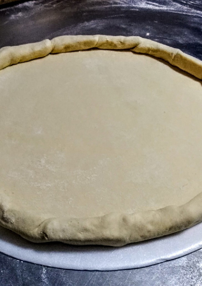 Una foto de MASA para Pizza con Borde de Queso...!