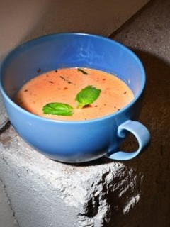 A picture of Rich & creamy Tomato Basil soup.