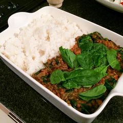 A picture of Coconut, lentil and spinach curry (Vegan).
