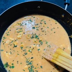 A picture of Paneer in rich cashew tomato gravy.