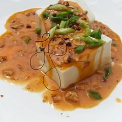 A picture of Peanut Butter Dressing On Tofu.