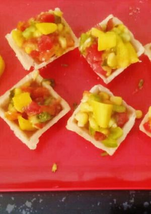 A picture of Mango salsa appetizer bites.
