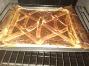 Una foto de quiche con base de hojaldre