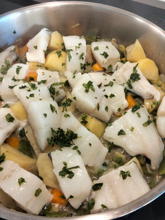 Una foto de Bacalao con verduras