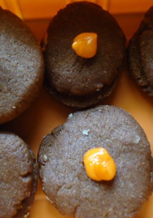 A picture of Chocolate Cookies with Orange butter cream.