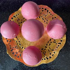 Pink tea chocolate bombs A picture of Pink tea chocolate bombs.