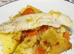 Foto principal de Pescado horneado con mantequilla especiada