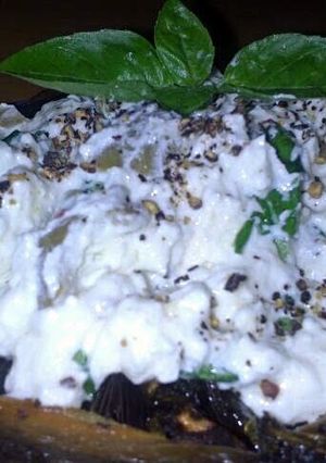 A picture of Sig's Two Cheese Spread, Basil, Garlic and Olives.