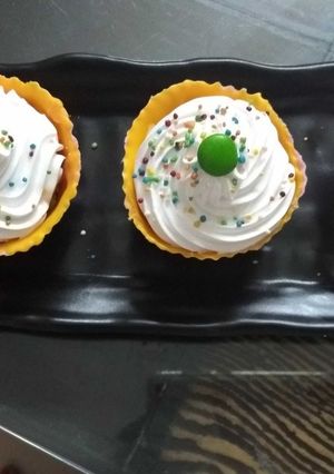 A picture of Fruit pudding in mango strawberry chocolates cup.