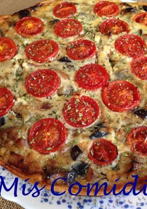 Una foto de Quiche de berenjenas, tomatitos y bacon