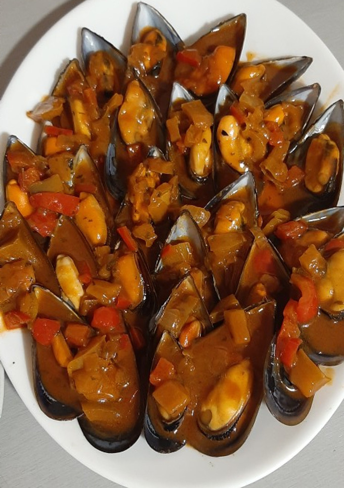 Una foto de Mejillones en salsa