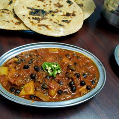 A picture of Chana aalu masala.