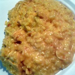 creamy chicken and yellow rice A picture of creamy chicken and yellow rice.