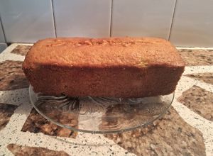 Una foto de Budín de tangerina y durazno con arándanos, cerezas un sabor a naranja🫐🍋🍒🍑🍊