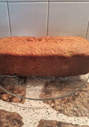 Una foto de Budín de tangerina y durazno con arándanos, cerezas un sabor a naranja🫐🍋🍒🍑🍊