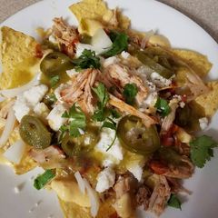 A picture of BBQ Pulled Pork Nachos.