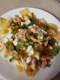 A picture of BBQ Pulled Pork Nachos.