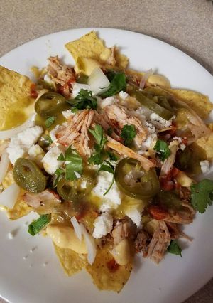 A picture of BBQ Pulled Pork Nachos.