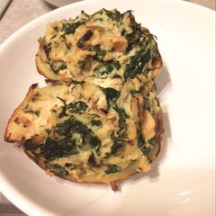 A picture of Twice Baked Potato with Spinach and Artichoke.