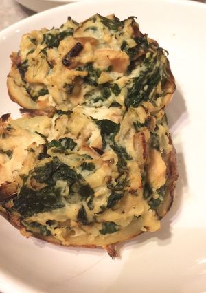 A picture of Twice Baked Potato with Spinach and Artichoke.