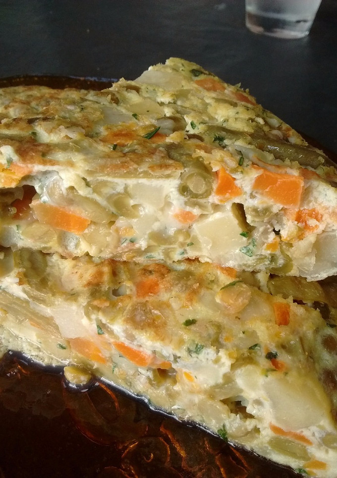 Una foto de Tortilla de vegetales  enlatados