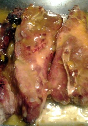 A picture of country style ribs in duck sauce.