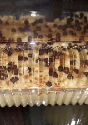 Una foto de Napoleón 3 leches con canela y chispas de chocolate de la casa