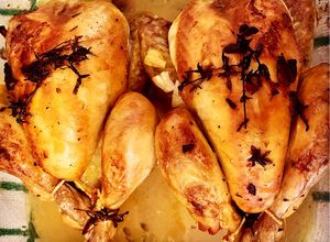 Foto principal de Picantones al horno con cítricos, ajo y tomillo