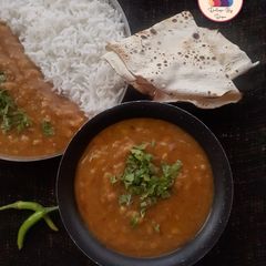 A picture of Panchmel Dal with steamed rice.
