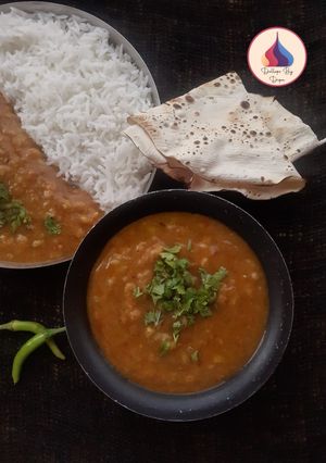 A picture of Panchmel Dal with steamed rice.