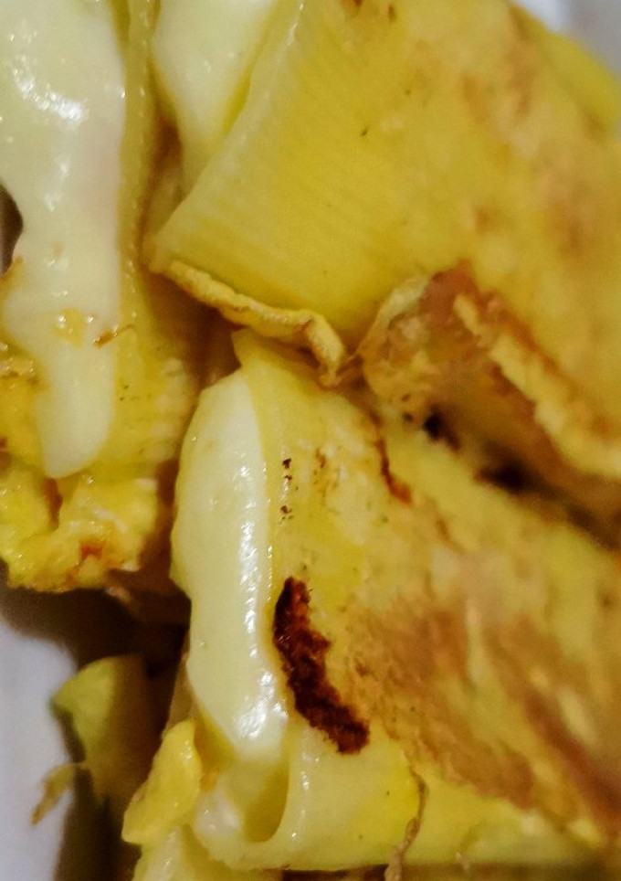 Una foto de Canelones con huevo, rellenos de queso